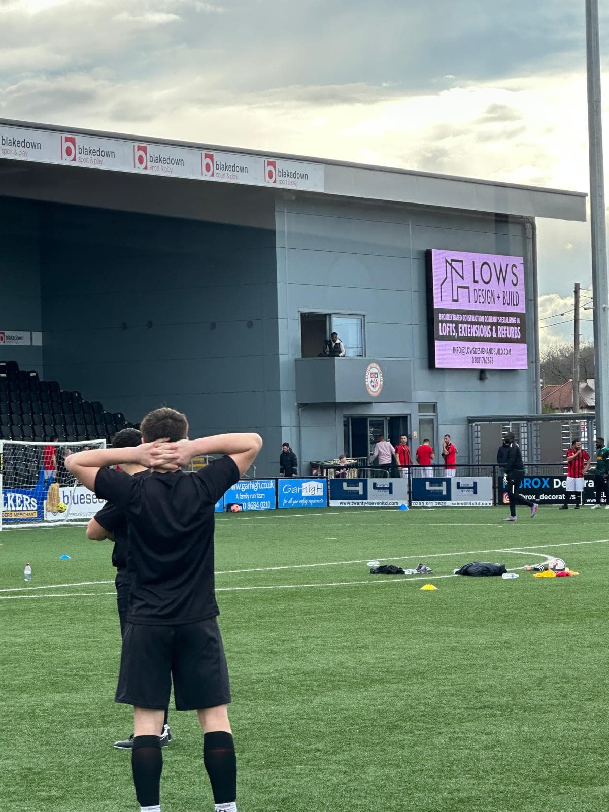 Lows Design and Build Bromley FC LED pitch-side advertising banner, brand at stadium scale